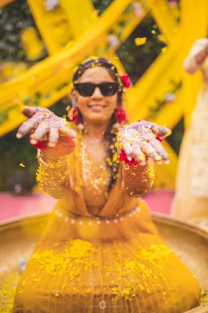 Haldi ceremony, bride, Vidushi, wedding photography, vibrant, pre-wedding ritual